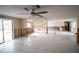 Living room with access to patio, currently being renovated at 9830 San Sierra Way, Port Richey, FL 34668