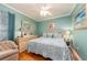 King-size bed, ensuite bathroom access, and light-filled space at 10036 63Rd N Ave # 23, St Petersburg, FL 33708
