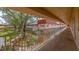 Exterior view of a community corridor with lush landscaping and a courtyard at 10036 63Rd N Ave # 23, St Petersburg, FL 33708