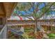Exterior view of condo building with stairs and courtyard at 10036 63Rd N Ave # 23, St Petersburg, FL 33708