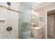 Clean bathroom with shower, vanity, and linen storage at 10036 63Rd N Ave # 23, St Petersburg, FL 33708