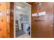 Small pantry with shelves and a chest freezer at 10036 63Rd N Ave # 23, St Petersburg, FL 33708