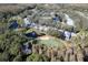 Aerial view of house and surrounding golf course at 15836 Sanctuary Dr, Tampa, FL 33647