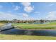 Scenic view of the water, golf course, and luxurious homes at 2400 Feather Sound Dr # 926, Clearwater, FL 33762