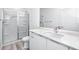 Modern bathroom with white vanity, quartz countertop and shower at 3402 E 28 Ave # 1, Tampa, FL 33605