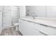 Modern bathroom with white vanity, quartz countertop and shower at 3402 E 28Th Ave # 1, Tampa, FL 33605