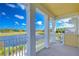 Spacious balcony with scenic views of water and golf course at 3731 Tea Leaf Aly, Land O Lakes, FL 34638