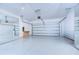 Spacious garage with white walls and polished floor at 3731 Tea Leaf Aly, Land O Lakes, FL 34638