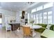 Open and bright kitchen with island, breakfast nook and hardwood floors at 3731 Tea Leaf Aly, Land O Lakes, FL 34638