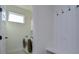Laundry room with washer, dryer, and built-in storage at 3731 Tea Leaf Aly, Land O Lakes, FL 34638