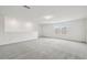 Spacious bonus room with neutral carpeting, and natural light from the windows at 4187 Feldspar Ln, Spring Hill, FL 34609