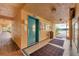 Condo hallway with elevator, mailbox area, and tiled floors at 4530 Pinebrook Cir # 208, Bradenton, FL 34209