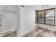 Bright bedroom with hardwood floors and large windows at 4530 Pinebrook Cir # 208, Bradenton, FL 34209