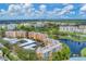 Aerial view of community near golf course and water at 4530 Pinebrook Cir # 208, Bradenton, FL 34209