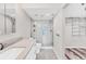 Updated bathroom with modern vanity and walk-in shower at 4530 Pinebrook Cir # 208, Bradenton, FL 34209