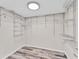 Large walk-in closet with ample shelving and hanging rods at 4530 Pinebrook Cir # 208, Bradenton, FL 34209