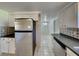 Kitchen with stainless steel appliances and dark countertops at 5301 82Nd N Ave, Pinellas Park, FL 33781