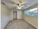 Spacious bedroom with carpeted floors and a large closet at 5301 82Nd N Ave, Pinellas Park, FL 33781