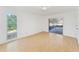 Bright bedroom with sliding glass doors to the outside, and laminate flooring throughout at 5344 Lowell Ave, Spring Hill, FL 34609