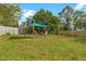 Relaxing backyard setting with shaded seating area at 5344 Lowell Ave, Spring Hill, FL 34609