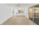 Light and bright dining area with hardwood floors and access to patio at 5344 Lowell Ave, Spring Hill, FL 34609