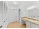 Clean bathroom with a vanity, shower, and ample storage at 5344 Lowell Ave, Spring Hill, FL 34609