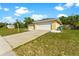 Attached garage with a large driveway at 5344 Lowell Ave, Spring Hill, FL 34609