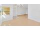 Bright dining room with light wood floors and large window at 5344 Lowell Ave, Spring Hill, FL 34609