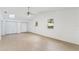 Large main bedroom with light wood floors, vaulted ceiling and ceiling fan at 5344 Lowell Ave, Spring Hill, FL 34609
