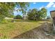 Large backyard with a shed and plenty of space for outdoor activities at 5344 Lowell Ave, Spring Hill, FL 34609