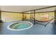 Relax in this covered patio with a hot tub and hammock at 5344 Lowell Ave, Spring Hill, FL 34609
