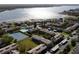 Bird's-eye view of community near the waterfront with tennis courts at 9209 Seminole Blvd # 75, Seminole, FL 33772