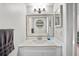 Clean bathroom with a white vanity and mirror at 9209 Seminole Blvd # 75, Seminole, FL 33772