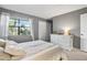 Bright bedroom with a dresser and window at 9209 Seminole Blvd # 75, Seminole, FL 33772