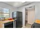 Kitchen features black appliances and wood countertops at 9209 Seminole Blvd # 75, Seminole, FL 33772