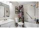 Bathroom with shower/tub and floral curtain at 9209 Seminole Blvd # 75, Seminole, FL 33772