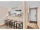 Small kitchen with breakfast bar and modern appliances at 9209 Seminole Blvd # 75, Seminole, FL 33772