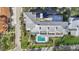 Aerial view showcasing the building's pool and surrounding landscaping at 1050 Riverside Dr # A201, Palmetto, FL 34221