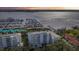 Stunning aerial view showcasing the building's waterfront location and marina at 1050 Riverside Dr # A201, Palmetto, FL 34221