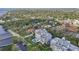 Aerial view of a waterfront condo building with a pool at 1050 Riverside Dr # A201, Palmetto, FL 34221