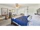 Cozy bedroom with a queen-size bed and ample closet space at 1050 Riverside Dr # A201, Palmetto, FL 34221
