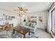 Relaxing living room with comfortable seating and access to dining area at 1050 Riverside Dr # A201, Palmetto, FL 34221