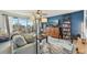 Living room boasts water views, comfy seating, and built-in shelving at 1050 Riverside Dr # A201, Palmetto, FL 34221