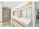 Clean bathroom with a shower/tub combo and double vanity at 1050 Riverside Dr # A201, Palmetto, FL 34221