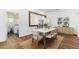Modern dining room with marble table and kitchen views at 106 E Calhoun St, Plant City, FL 33563