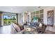 Bright living room featuring modern furniture and a view of the backyard at 18006 Tavernside Trl, Lakewood Ranch, FL 34211