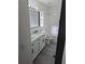 Modern bathroom with double vanity and bathtub at 2406 E 31St Ave, Tampa, FL 33610