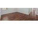 Empty spare bedroom with dark hardwood floors at 2811 Maple Brook Loop, Lutz, FL 33558