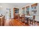 Bright dining area with hardwood floors and view into kitchen at 2908 N Central Ave, Tampa, FL 33602