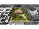 Overhead view of gorgeous property, lush landscaping, circular drive, and waterfront access at 306 Blanca Ln, Tampa, FL 33606